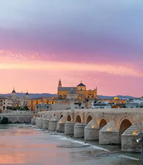 Images Dated 16th April 2015: Cathedral (Mezquita) and Roman bridge at sunset, Guadalquivir river, Cordoba, Andalusia