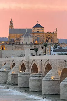 Images Dated 16th April 2015: Cathedral (Mezquita) and Roman bridge at sunset, Guadalquivir river, Cordoba, Andalusia