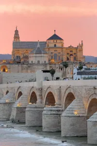 Images Dated 16th April 2015: Cathedral (Mezquita) and Roman bridge at sunset, Guadalquivir river, Cordoba, Andalusia