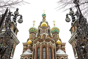 Cathedral Savior on the Spilled Blood (Khram Spasa na Krovi) as seen through the gates of the Mikhailovsky Garden (Mikhailovsky Sad), Saint Petersburg, Russia