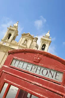 Images Dated 12th April 2011: Cathedral and Telephone box in Zebbug, Malta