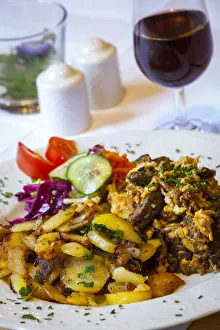 'Cats Cry', a traditional Black Forest dish of baked strips of beef with onion 'Cats Cry', a traditional Black Forest dish of baked strips of beef with onion