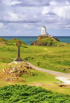 Anglesey Prints: Celtic cross and Twr Mawr lighthouse on Llanddwyn Island in Anglesey, Wales