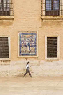 Ceramic Prints: A ceramic wall tile with a religious icon on Valencia Cathedral, Valencia, Spain