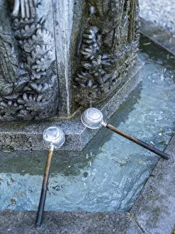 Ceremonial purification rite at the Adashino-nembutsu-ji, Arashiyama, Kyoto, Japan Ceremonial purification rite at the Adashino-nembutsu-ji, Arashiyama, Kyoto, Japan