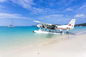 Plane Prints: Cessna landed on Whitehaven Beach, Whitsundays. Queensland, Australia