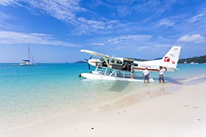 Cessna landed on Whitehaven Beach, Whitsundays. Queensland, Australia
