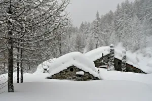 Chalet, mountain village covered by snow, Close to Ceresole Reale, Piedmont,Italy Chalet, mountain village covered by snow, Close to Ceresole Reale, Piedmont,Italy