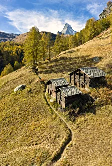 Cervino Prints: Characteristic huts in autumn with Matterhorn in the background
