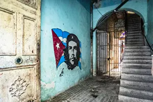 Street Art Prints: Che Guevara street art in an entrance of an old house in La Habana Vieja (Old Town)
