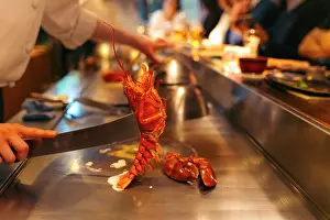 Cook Prints: Chef prepares lobster teppanyaki for diners in Tokyo, Japan