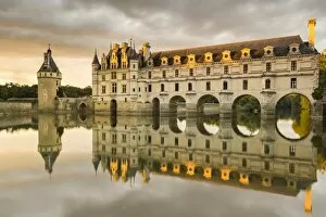 Images Dated 12th December 2017: Chenonceau castle reflects itself on the Loire at sunset. Chenonceaux, Indre-et-Loire