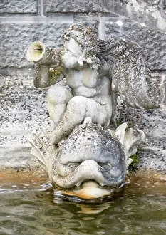 Figures Prints: A cherub statue in the fountain at the Loggia, Italian Garden, Hever Castle, Kent, England