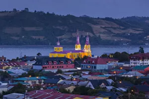 Images Dated 4th July 2013: Chile, Chiloe Island, Castro, Iglesia de San Francisco church, elevated view, dusk