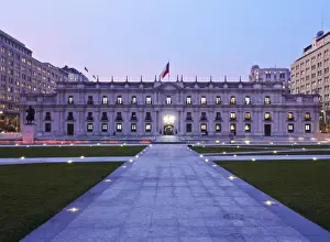 Chile, Santiago, Twilight view of La Moneda Palace from the Plaza de la Ciudadania