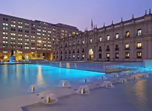 Chile, Santiago, Twilight view of La Moneda Palace from the Plaza de la Ciudadania