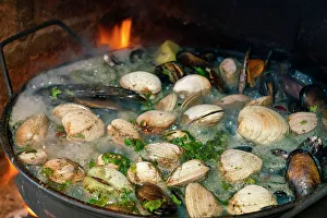 Chilean dish named mariscos al disco on open fire, Valparaiso, Valparaiso Province, Valparaiso Region, Chile