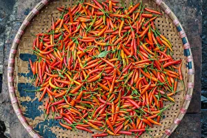 Old Quarter Prints: Chili peppers for sale in basket at Dong Xuan Market, Hoan Kiem District, Old Quarter