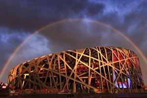 China, Beijing, Olympic park and famous birds nest stadium made of steel illuminated China, Beijing, Olympic park and famous birds nest stadium made of steel illuminated