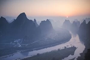 Yangshuo Gallery: China, Guanxi, Yangshuo. Sunrise over Li river and karst peaks, elevated view