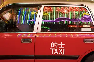 Advertisement Prints: China, Hong Kong, Wan Chai, nightlife neon reflected in a Hong Kong taxi window