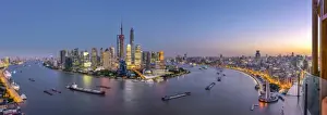 China, Shanghai, Pudong District Skyline across Huangpu River