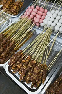 Images Dated 4th August 2008: China, Yunnan Province, Erhai Hu Lake Area, Xizhou, town market, meat skewers at food
