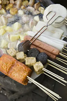 China, Yunnan Province, Lijiang, Old Town, Lijiang Market, fried potatoes and snacks