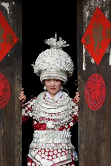 Headdress Prints: China, Zhonghua, Guizhou, Miao woman dressed in traditional costume