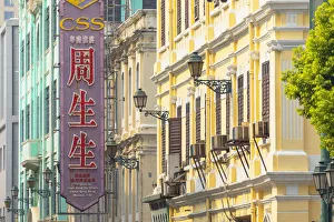 Chinese sign and colonial buildings, Macau, China