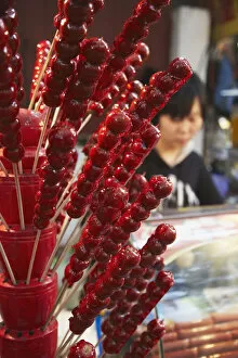 Images Dated 5th January 2011: Chinese toffee apples for sale on food stall, Fuzi Miao area, Nanjing, Jiangsu, China