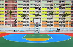 Sitting Prints: Choi Hung Estate rooftop basketball court and rainbow buildings