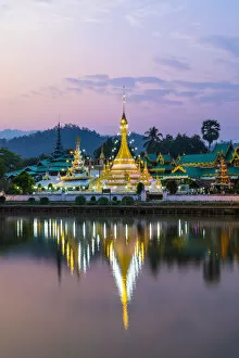 Images Dated 4th June 2020: Chong Kham lake and Wat Chong Kham temple in the background at sunrise, Mae Hong Son