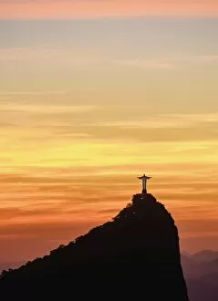 Rio De Janeiro Gallery: Christ the Redeemer and Corcovado Mountain at sunrise, Rio de Janeiro, Brazil