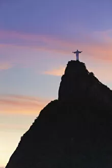Images Dated 12th October 2012: Christ the Redeemer statue (Cristo Redentor) at sunset, Corcovado, Rio de Janeiro, Brazil