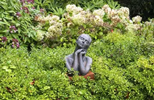Gardening Prints: Christine Baxters sculpture Sunworshipper at Borde Hill Garden, Sussex, England
