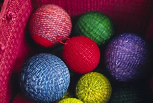 Gift Prints: Christmas decorations woven from straw fibre are colourful