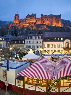 Christmas market at the Karlsplatz in Heidelberg with view towards the Heidelberg castle