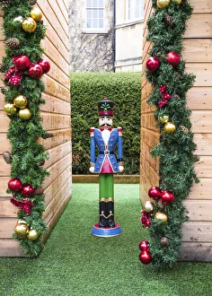 Doll Prints: A Christmas nutcracker in a garden, Bath, Somerset, England