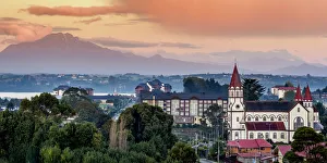 Geography Prints: Church and Calbuco Volcano at sunset, Puerto Varas, Llanquihue Province, Los Lagos Region