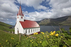 Bright Gallery: The church of HÔêÜÔê½sar in a sunny day. Island of Kalsoy. Faroe Islands