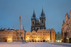 Tynsky Chram Prints: Church of our lady before Tyn at snow-covered Old Town Square at twilight in winter