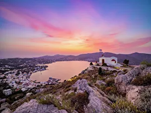 Aegean Sea Prints: Church of Prophet Elias over the town of Agia Marina at sunset