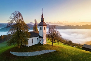 Skofja Loka Prints: Church of Saint Thomas at sunrise in autumn