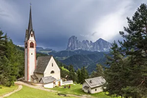 Church of San Giacomo with Sassolungo Group in the background. Ortisei, Gardena Valley
