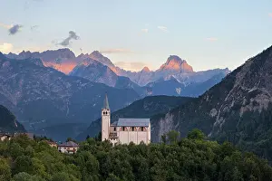 Cadore Prints: The church of San Martino with Cima dei Preti - Duranno group on the background at sunset
