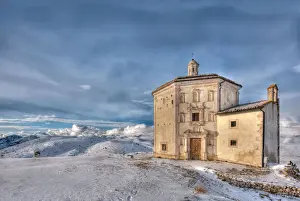 Calascio Prints: The church of Santa Maria della Pietaza at sunset in a winter day, Rocca Calascio