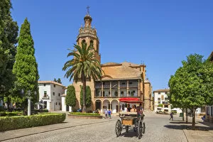 Church Santa Maria la Mayor with carriage, Ronda, Andalusia, Spain