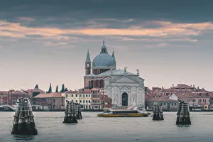 Church of Santissimo Redentore and venetian 'briccole', Venice, Veneto, Italy Church of Santissimo Redentore and venetian 'briccole', Venice, Veneto, Italy