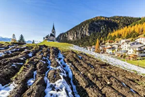 Images Dated 12th September 2017: The church of Schmitten surrounded by colorful woods and snow Albula District Canton